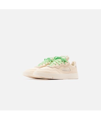 adidas Consortium x Pharrell Williams SC Premiere - Ecru Tint / Cream White / Clear Brown suggérées chez