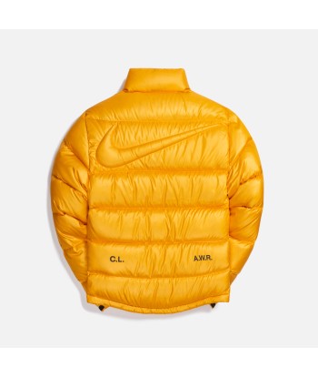 Nike x Drake Nocta Puffer Jacket - University Gold Comparez plus de prix