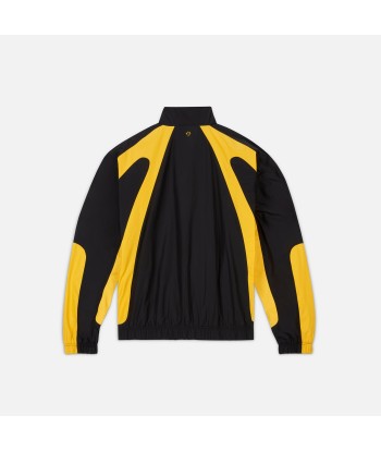 Nike x Drake Nocta Au Essential Track Jacket - Black / University Gold est présent 